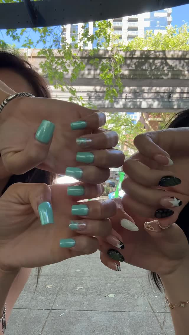 Mint green glossy square nails with black and white contrast accent nails